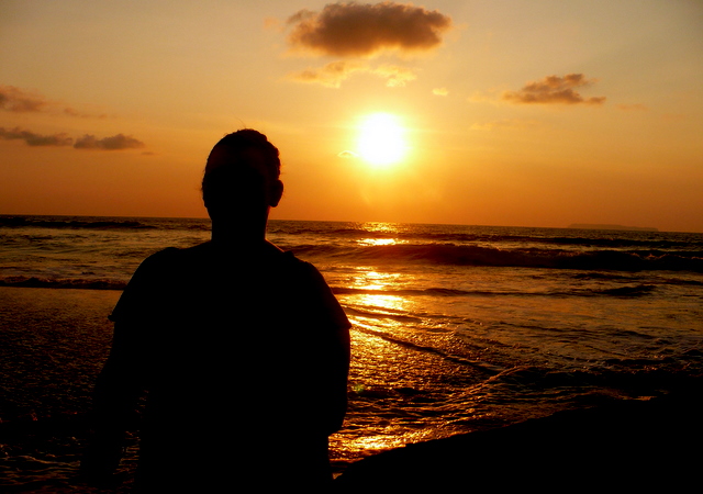 sunset in Costa Rica with shadow of person