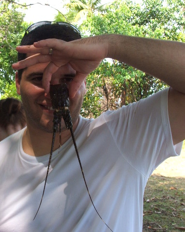 Osniel Gonzalez holding a lobster shell